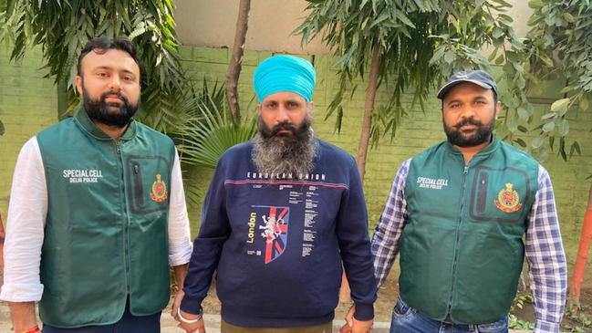 Rajwinder Singh arrested by Delhi police officers on Friday. Picture: Supplied