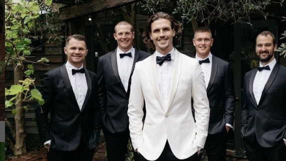 Giants defender Phil Davis got married on the Mornington Peninsula with fellow AFL players Patrick Dangerfield and Adam Tomlinson part of his wedding party.