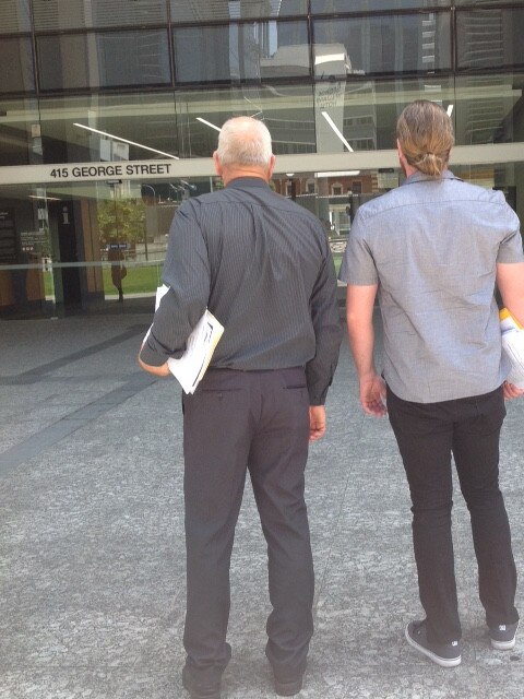 Excavator driver Warren Bruggy, left, and labourer, Daniel Boyd, who found the buried cash. Outside the Supreme Court in Brisbane