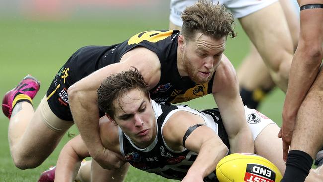 SANFL - Second Semi-Final - Glenelg v Port Adelaide, at Adelaide Oval. Boyd Woodcock under pressure from Michael Virgin Picture SARAH REED