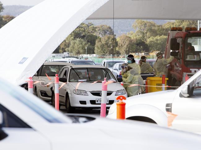 ADELAIDE, AUSTRALIA - NewsWire Photos JULY 20, 2021: Covid-19 testing coverage from the 24 hour Victoria Park Covid-19 testing station as South Australia battles to quash a potential coronavirus outbreak.Picture: NCA NewsWire / Emma Brasier