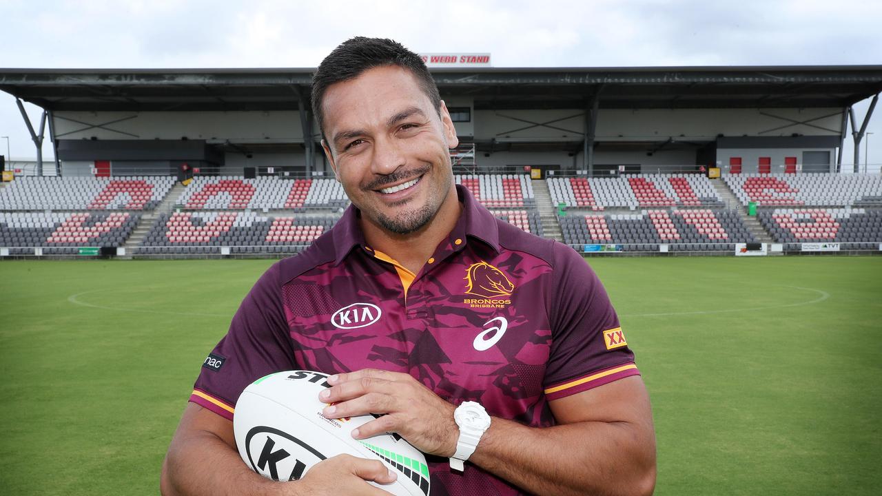 Brisbane Bronco Alex Glenn cradles and rocks a football after the birth of his third child, promoting his testimonial game against North QLD Cowboys to be played at Dolphin Stadium, Redcliffe. Photographer: Liam Kidston.