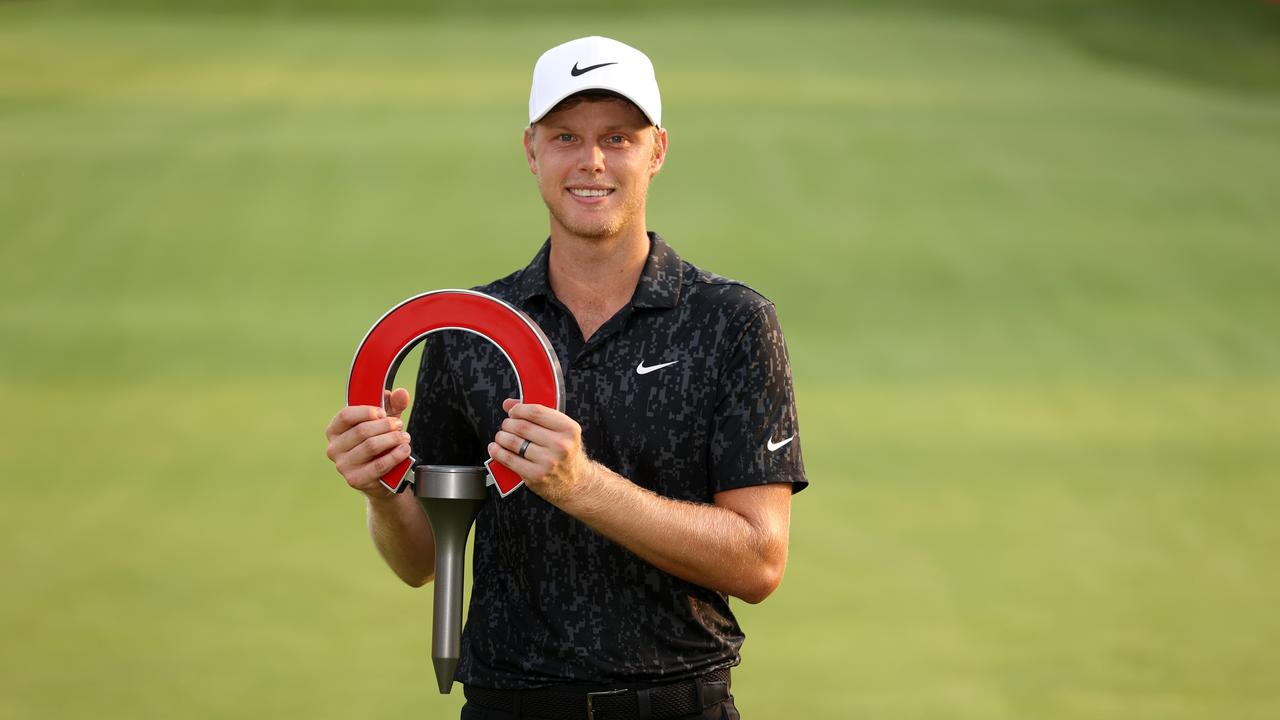 Australia’s Cameron Davis poses with the trophy after winning the Rocket Mortgage Classic in Detroit, Michigan. Picture: Gregory Shamus / Getty Images