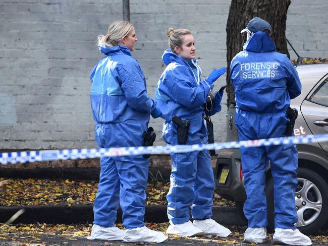 Forensic police at the scene. Picture: Tracey Nearmy