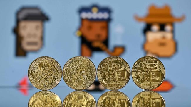 Crypto coins and NFTs. Picture: AFP.​