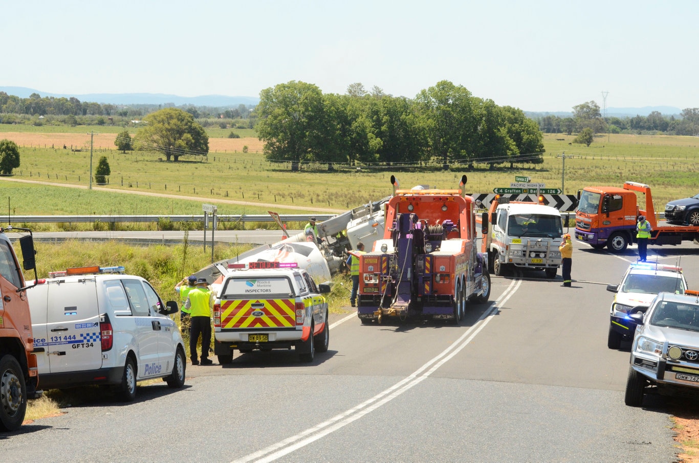 A cement truck came to rest in a ditch near the Pacific Highway, Centenary Drive intersection, north of Grafton, NSW. Picture: Jarrard Potter