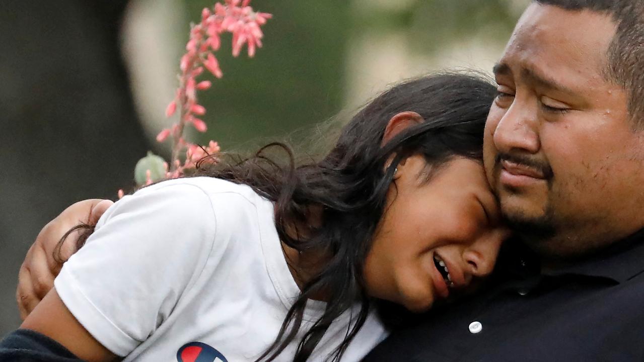 Broken relatives of victims were seen grieving outside the Texas school where 19 children and two teachers were shot dead. Picture: Reuters/Marco Bello