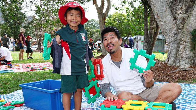 Takuma Oawa with his son Roy Oawa, 5, at the Whitfield State School Father's Day activity afternoon. Picture: Brendan Radke