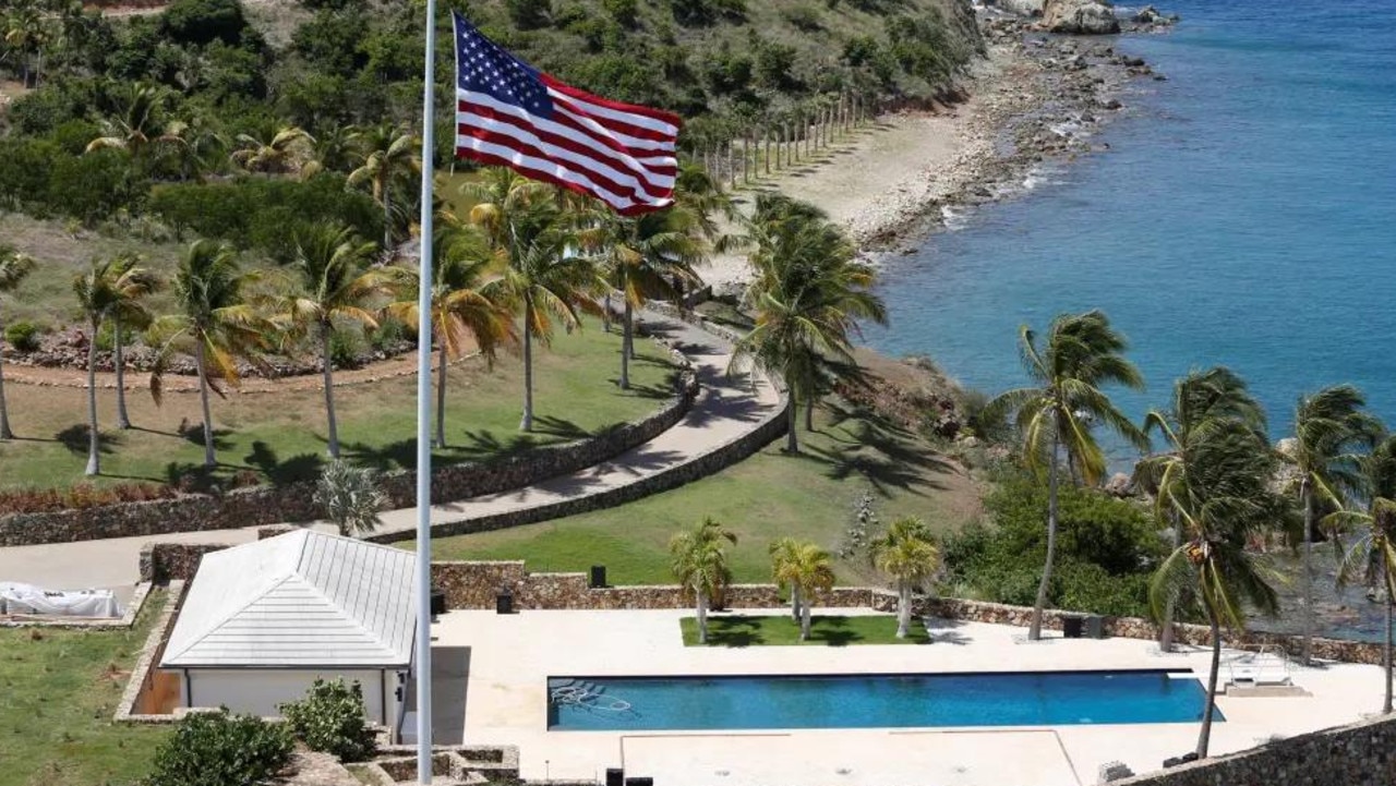 An American flag flies next to a swimming pool at Little St. James Island, one of the properties of financier Jeffrey Epstein, in an aerial view, near Charlotte Amalie, St. Thomas, U.S. Virgin Islands July 21, 2019. Picture: Reuters