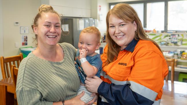 Inside the Townsville Ronald McDonald family room: Bravus' Tanya Brown with mother Shannara and her 12-month-old son Lucah