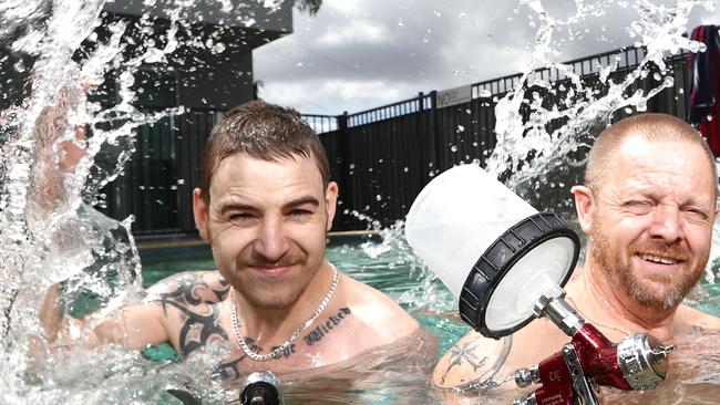 HHarvey Prestige employees Benjamin Bentley and Richard Kirby cool down. Photograph: Jason O'Brien