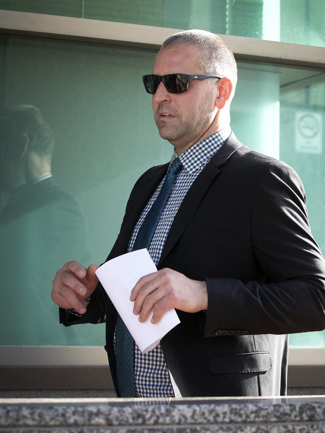 Daniel Bearman leaves the Hobart Magistrates Court. Picture: CHRIS KIDD