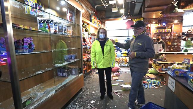 Seattle Mayor Jenny Durkan, left, surveys a game shop damaged in protests over the death of George Floyd. Picture: AP Photo/Elaine Thompson