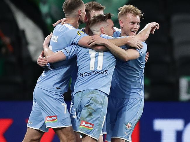 SYDNEY, AUSTRALIA - AUGUST 26: City players celebrate victory during the A-League Semi Final match between Melbourne City and Western United at Bankwest Stadium on August 26, 2020 in Sydney, Australia. (Photo by Mark Metcalfe/Getty Images)