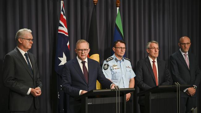 Home Affairs Minister Tony Burke, left, Anthony Albanese, Australian Federal Police Commissioner Reece Kershaw, Attorney-General Mark Dreyfus and ASIO Director-General Mike Burgess in Canberra on Monday. Picture: Martin Ollman / NewsWire