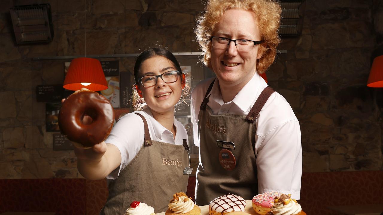 Porsha Gillott, Banjo’s senior staff member, and Colin Stack, shift supervisor, with the doughnuts. Picture: Nikki Davis-Jones