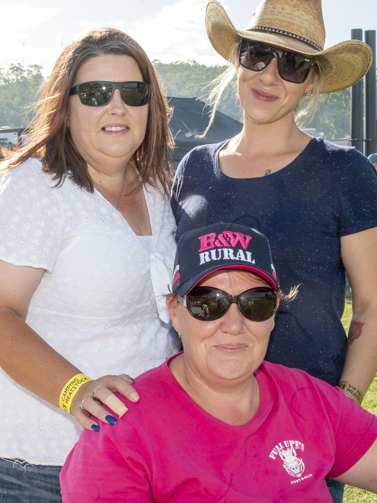 (from left) Rachel Sinclair, Katie Robertson and Tess Chard at Meatstock, Toowoomba Showgrounds. Friday, April 8, 2022. Picture: Nev Madsen.