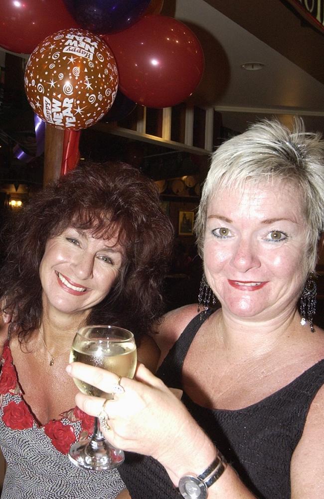 Sharon Ellis and Margaret Proctor celebrate New Year’s Eve at Mooloolaba in 2003. Picture: Barry Leddicoat.