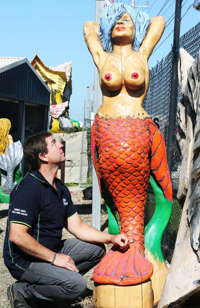 Wayne Jeffries received many complaints about a topless mermaid chainsaw carving at his business, in Baxter.