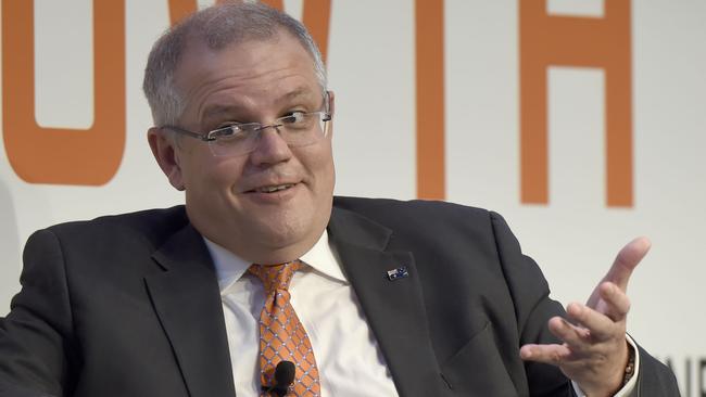 Federal treasurer Scott Morrison at The Australian Financial Review Business Summit in Melbourne yesterday. Picture: AAP Image/Mal Fairclough
