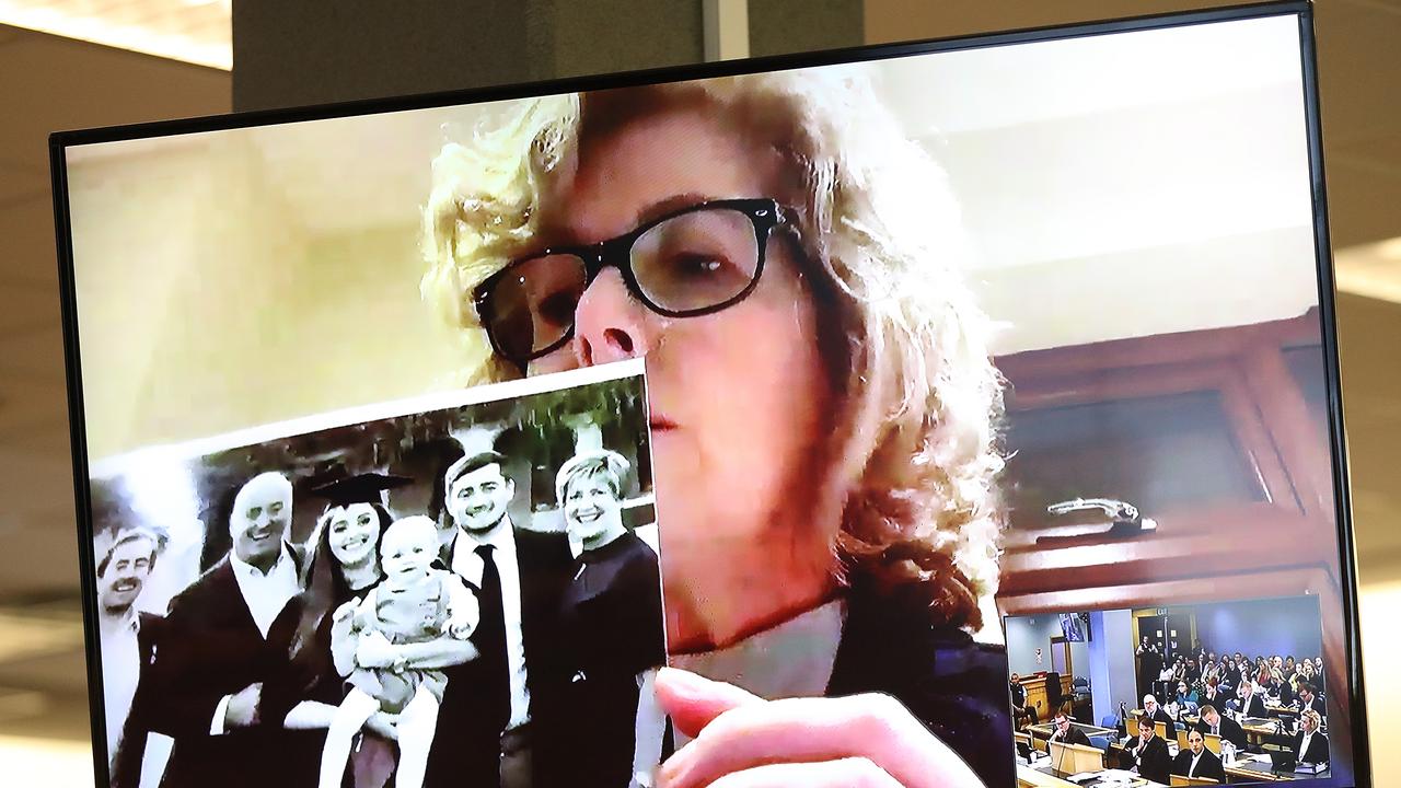 Gillian Millane holds a family photograph during her televised victim impact statement. Picture: Greg Bowker/Getty Images