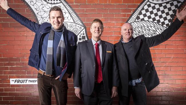 Maroondah councillor Mike Symon (centre) with artists Andy Drewitt and Roger Archbold in Croydon for the unveiling of <i>The Fruit Thief</i> last year. Picture: Daniel Pockett.