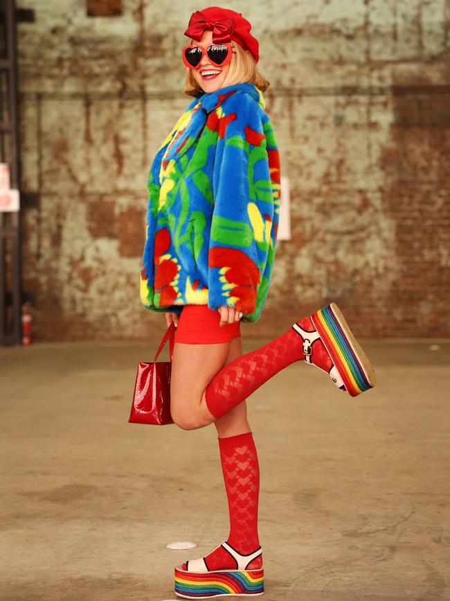 Eddie Riley opted for a rainbow outfit with platform sandals on the first day of Australian Fashion Week. Picture: Rohan Kelly