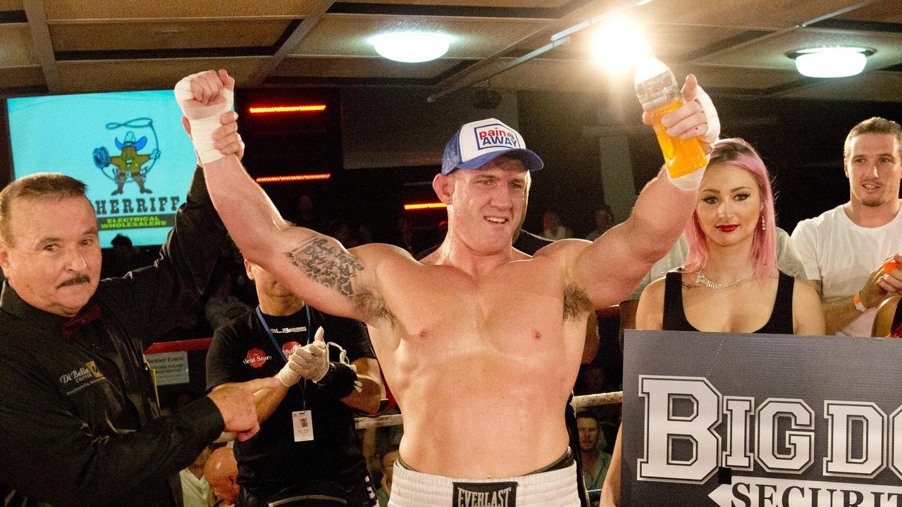 Paul Gallen and Herman Ene-Purcell fight it out in Toowoomba. Friday, Jan 29, 2016.