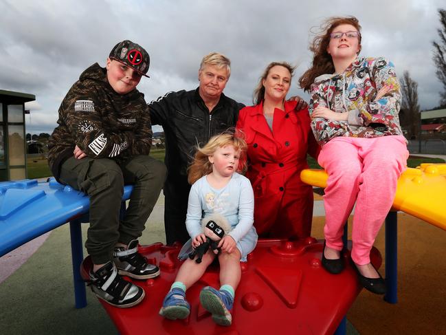 Julian and Kate Edwards’ three children, Joshua, 11, Sophia, 5, and Elisabeth, 13, all have autism and the family is concerned about possible changes to how autism is regulated under the NDIS. Picture: NIKKI DAVIS-JONES