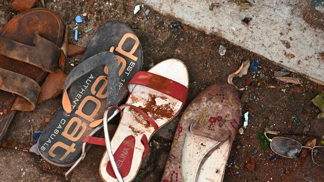 Shoes and belongings of victims are collected as evidence at St Sebastian's Church in Negombo. Picture: AFP 