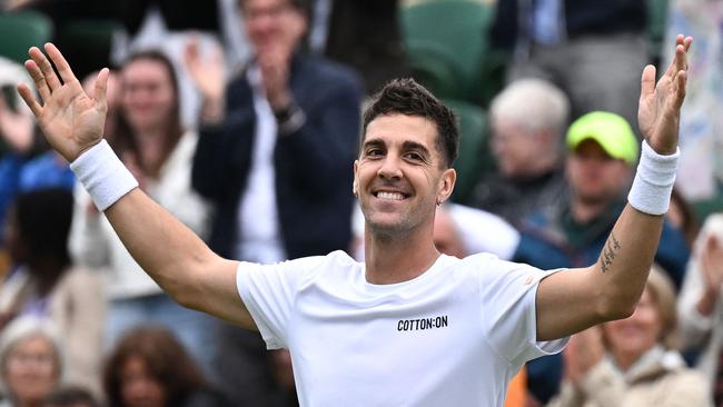 Thanasi Kokkinakis celebrates winning against Canada's Felix Auger-Aliassime. Picture: Ben Stansall/AFP