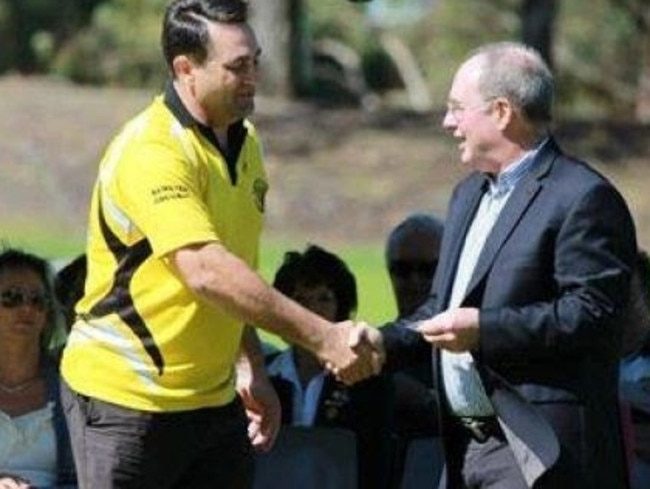 Bradley Edwards shakes hands with former WA Labor leader Eric Ripper during a presentation for his 10 years’ service at Kewdale Little Athletics Club in 2013. Picture: Facebook