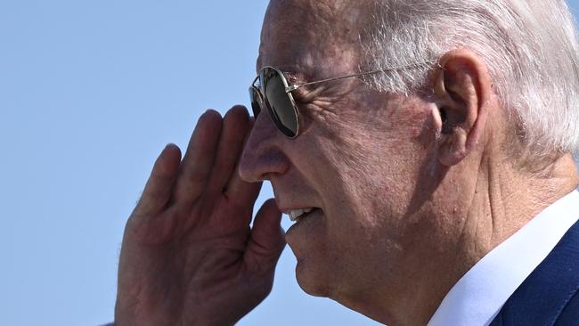 Joe Biden salutes as he disembarks from Air Force One at Joint Base Andrews in Maryland on Monday. Picture: AFP