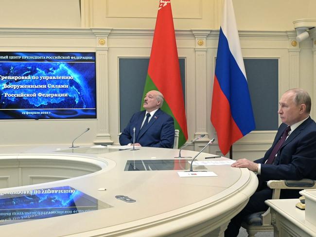 Russian President Vladimir Putin (R) and his Belarusian counterpart Alexander Lukashenko (L) watch training launches of ballistic missiles. Picture: AFP