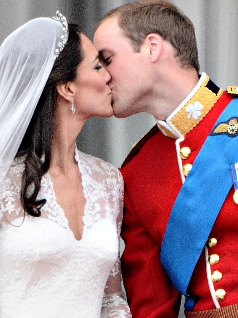 Britain's Prince William kisses wife Kate after their 2011 wedding. Picture: Leo Neal/AFP