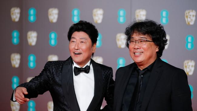 Song Kang Ho and director Bong Joon-ho on the red carpet upon arrival at the BAFTA awards at London’s Royal Albert Hall on February 2, 2020. Picture: Tolga Akmen / AFP.