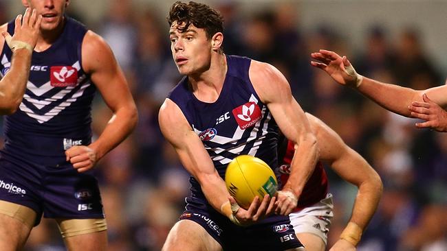 Lachie Neale fires off one of his 226 handballs for the season. Picture: Getty Images