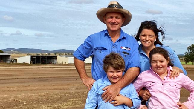 Stephen Schmidt with wife Claire, and children Amelie and Toby Schmidt on their Allora property Victoria Hill.