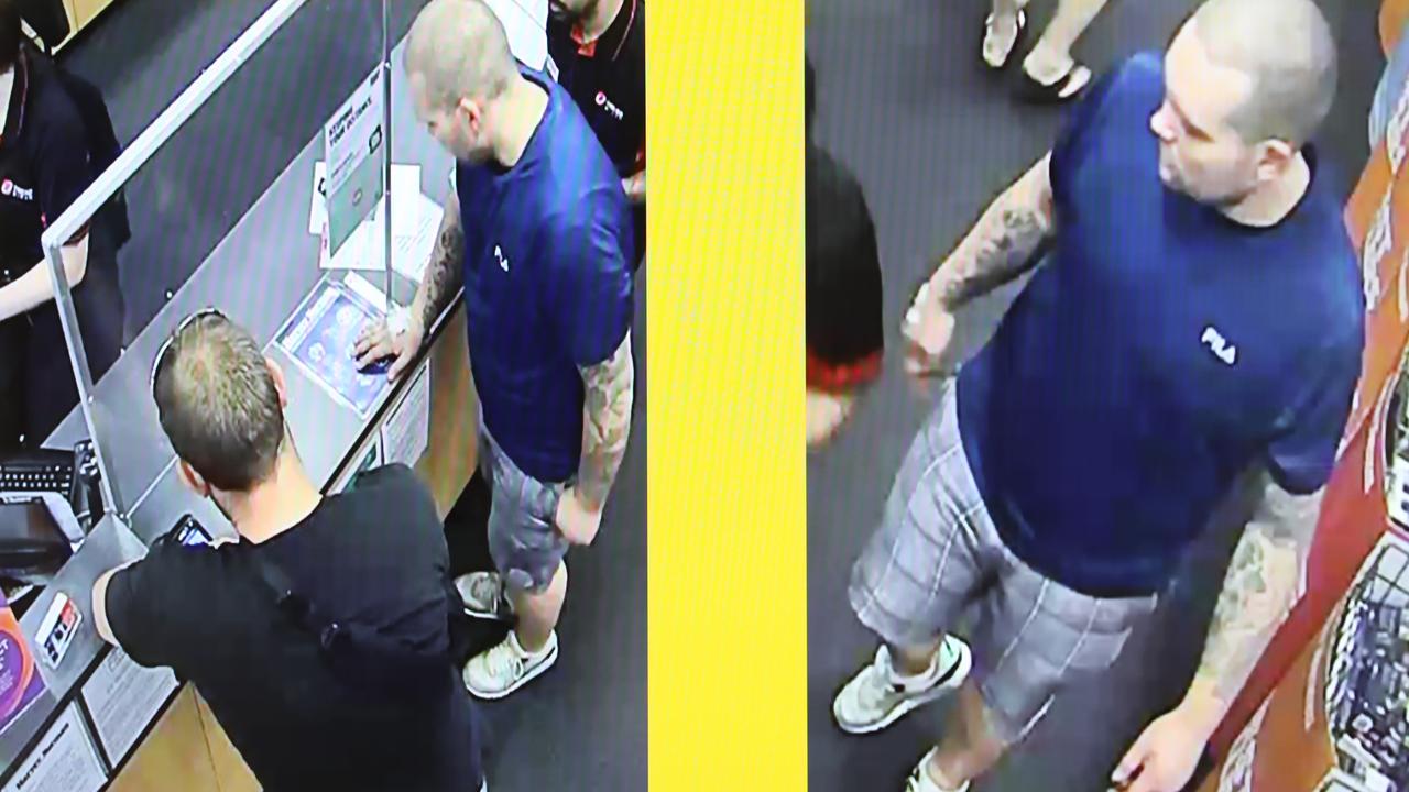 CCTV images of Robert Atkins (in blue) at BankSA, standing alongside one of the men who were forcing him to commit fraud the day before his death. Picture: Dean Martin