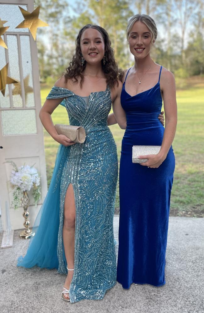 Keely Kerr and Paige Randell arrive at the 2024 Gympie State High School graduation formal.