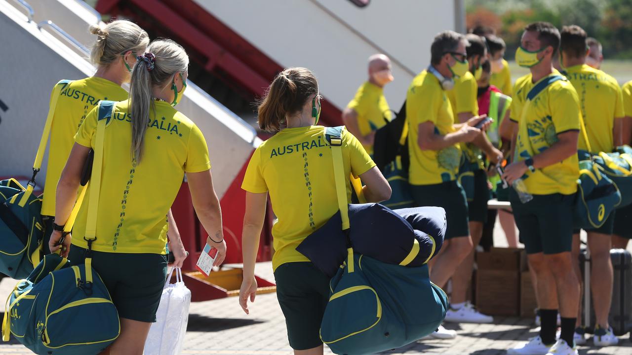 Australian Olympic team athletes and official fly out of Cairns Airport. Picture: Matthew McInerney