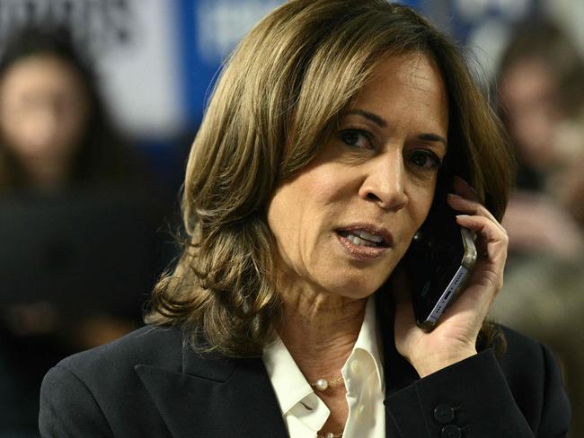 US Vice President and Democratic presidential candidate Kamala Harris takes part in a phone bank at the Democratic National Committee headquarters in Washington, DC, on November 5, 2024 (Photo by Brendan SMIALOWSKI / AFP)