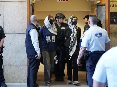 Protesters at Columbia University are led away by police. Picture: Supplied