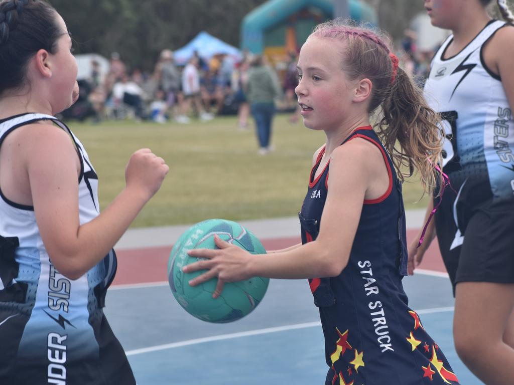 On court at the Cap Coast Junior Netball Carnival at the Barmaryee Multi Sports Precinct, Yeppoon, on August 11, 2024. Photo: Pam McKay