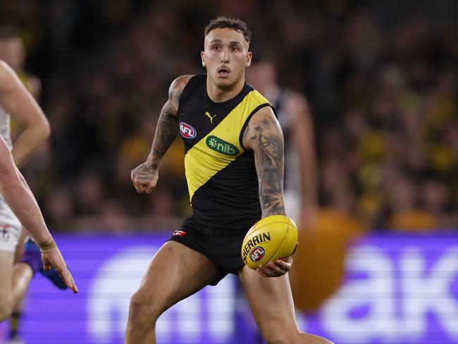 Shai Bolton of the Tigers runs with the ball during the round 22 AFL match between Richmond Tigers and St Kilda Saints. (Photo by Darrian Traynor/Getty Images)