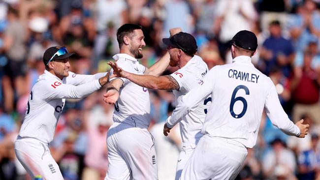 Chris Woakes celebrates snaring the huge scalp of Usman Khawaja. Picture: Getty