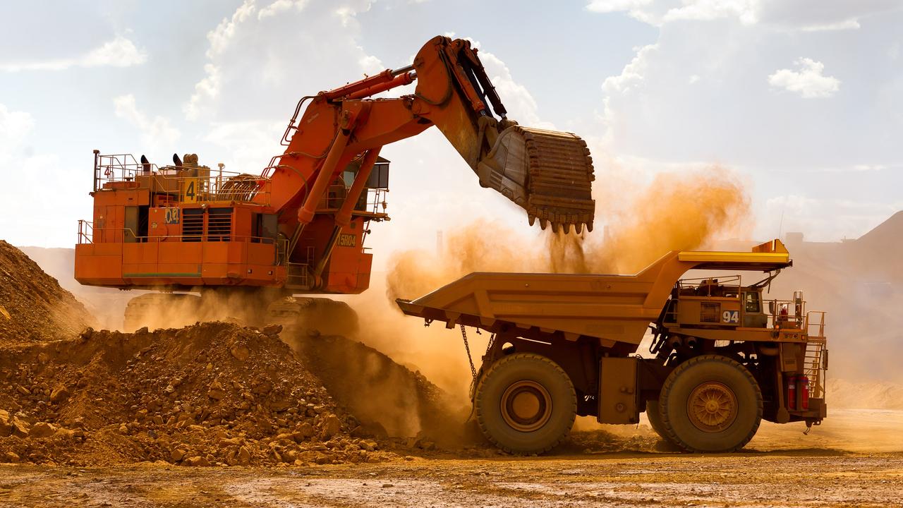 A haul truck is loaded by a digger with material from the pit at Rio Tinto Group's West Angelas iron ore mine. Picture: Ian Waldie/Bloomberg via Getty Images