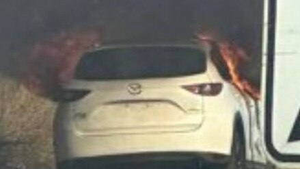 CCTV captures Kayla’s 2020 Mazda CX-5 going up in flames beside the Warrego Hwy.