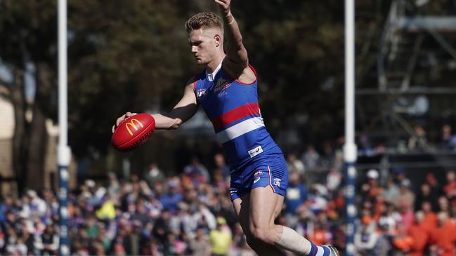 Adam Treloar injured his left calf in the warm-up before the Bulldogs’ round 24 win over GWS but played through the game and is poised to play again on Friday night. Picture: Daniel Pockett / Getty Images