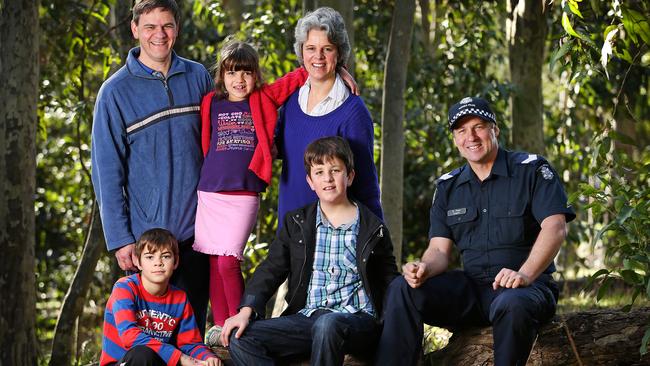 Luke with parents Tim and Rachel, brother Matthew, sister Lauren and Sgt Greg Paul. Picture: Mark Stewart